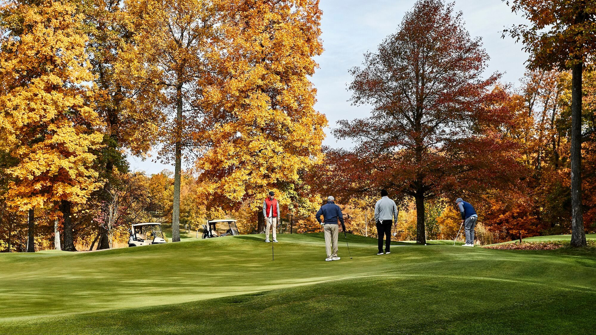 Golfers on the Highland Course at Primland in autumn